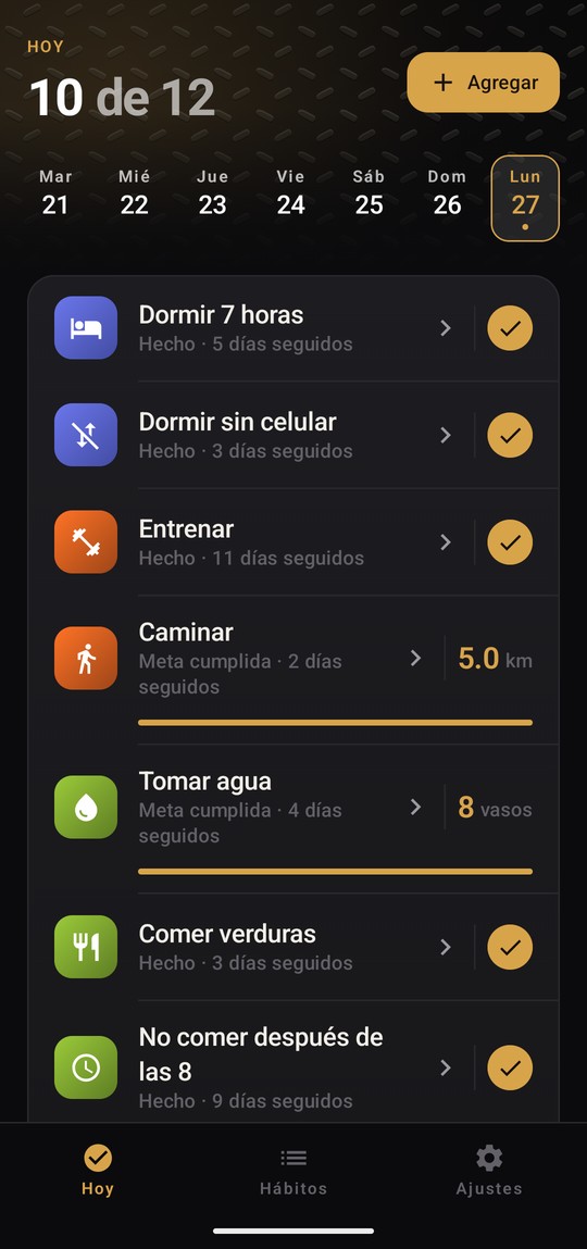 The Hierro Vivo daily screen, showing ten of twelve habits done, with checkmarks, a walking goal and a water goal.